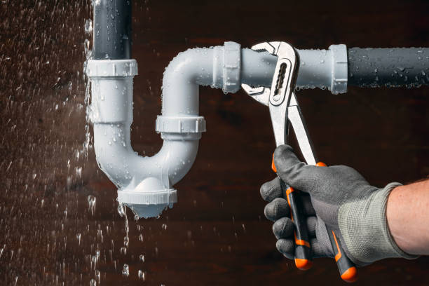 Professional Drain Cleaning technician working in Mineola, NY
